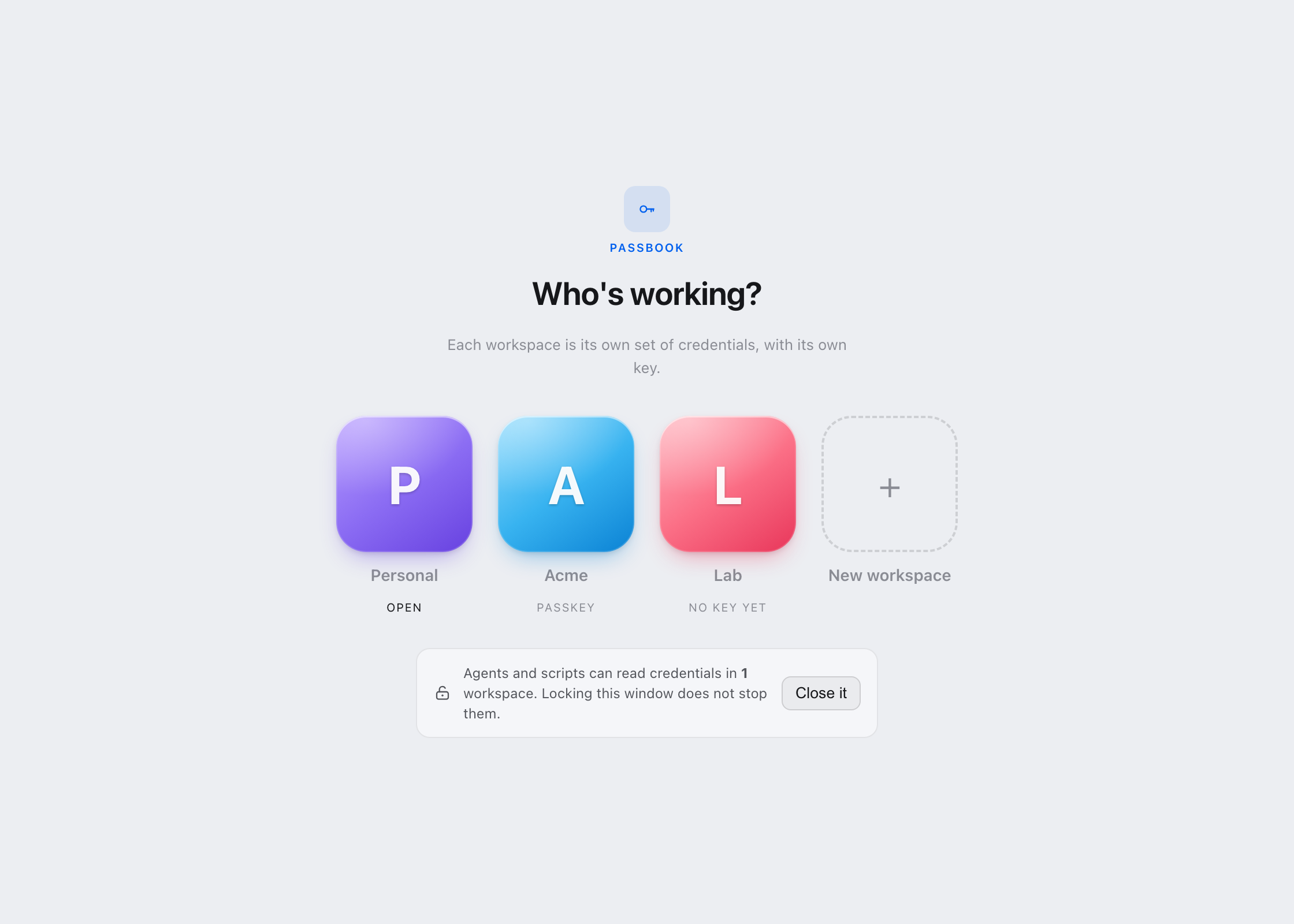 The workspace picker showing Personal, Acme and Lab, each with its own key